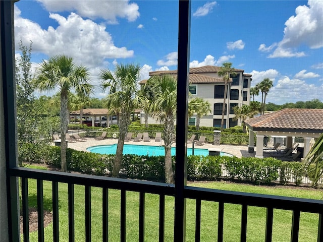 community pool with a gazebo