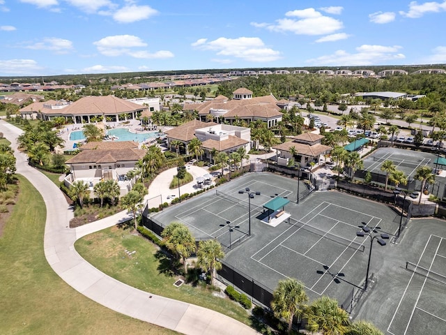 aerial view of residential area featuring a pool area