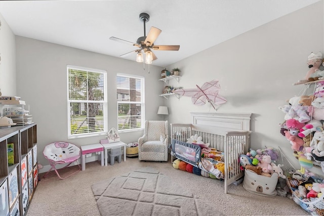 1017 Fernleaf Run, Bradenton, FL 34212 - carpeted bedroom with a nursery area and a ceiling fan