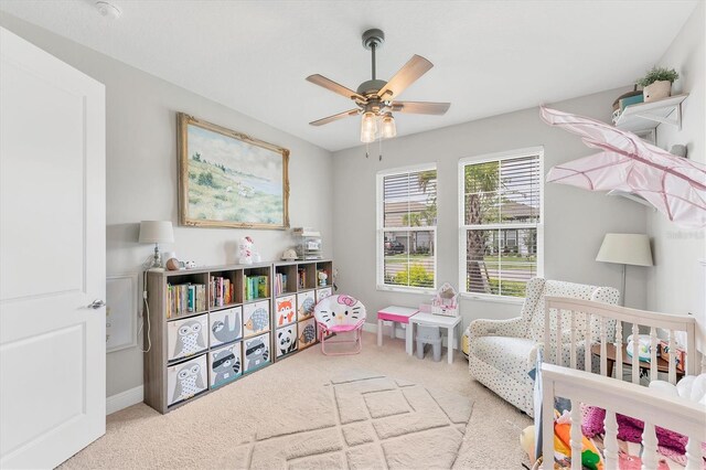 1017 Fernleaf Run, Bradenton, FL 34212 - bedroom with carpet floors, baseboards, and ceiling fan