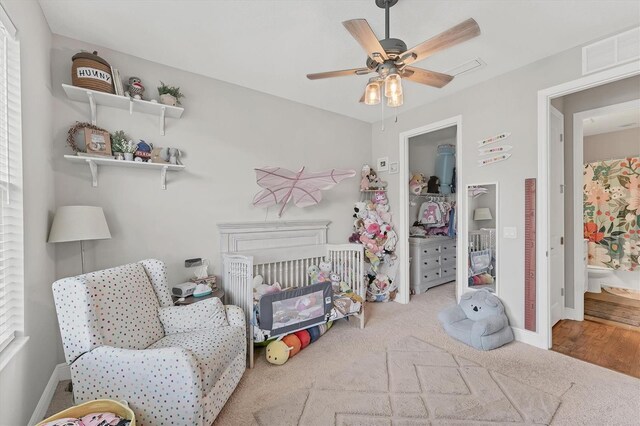 1017 Fernleaf Run, Bradenton, FL 34212 - carpeted bedroom with baseboards and ceiling fan