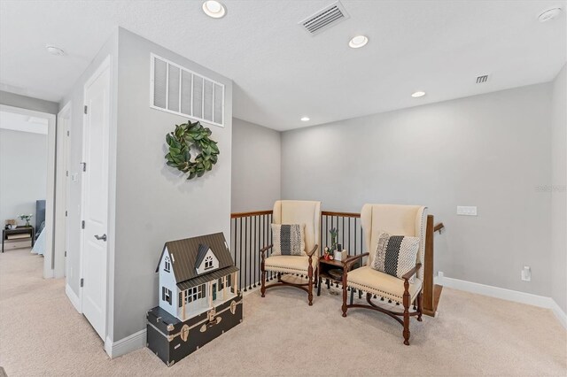 1017 Fernleaf Run, Bradenton, FL 34212 - sitting room featuring carpet, baseboards, and recessed lighting