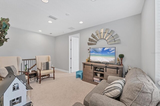 1017 Fernleaf Run, Bradenton, FL 34212 - carpeted living room with recessed lighting and baseboards