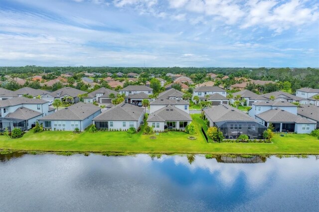 1017 Fernleaf Run, Bradenton, FL 34212 - aerial perspective of suburban area with a large body of water