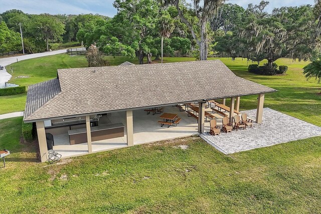 1017 Fernleaf Run, Bradenton, FL 34212 - surrounding community with a patio area, a gazebo, and a lawn