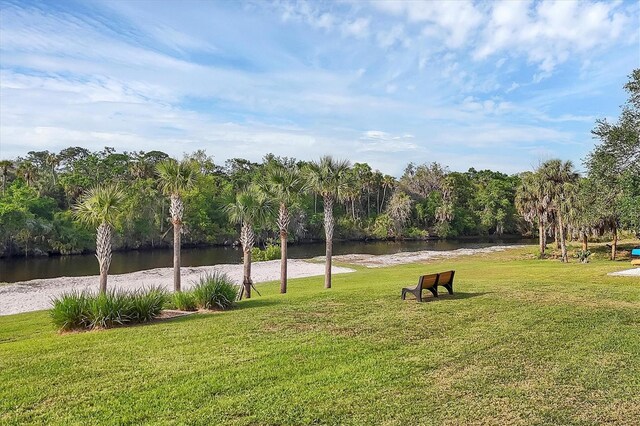 1017 Fernleaf Run, Bradenton, FL 34212 - view of home's community featuring a water view and a yard