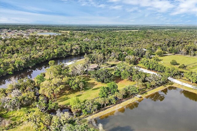 1017 Fernleaf Run, Bradenton, FL 34212 - view of property location featuring a nearby body of water and a heavily wooded area