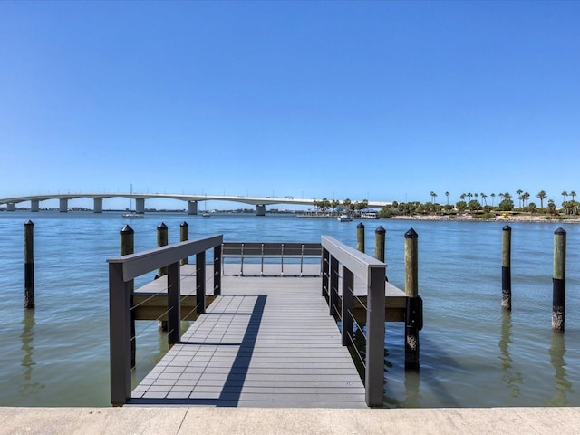 226 Golden Gate Pt Unit 63, Sarasota, FL 34236 - dock area featuring a water view