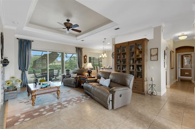 385 165th Ct NE, Bradenton, FL 34212 - living area with ceiling fan, light tile patterned flooring, arched walkways, a raised ceiling, and ornamental molding