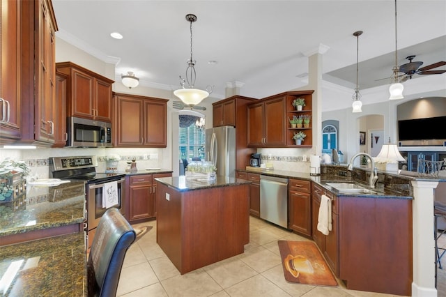 385 165th Ct NE, Bradenton, FL 34212 - kitchen with stainless steel appliances, a sink, open shelves, a ceiling fan, and crown molding