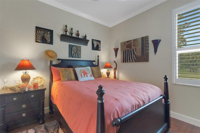 385 165th Ct NE, Bradenton, FL 34212 - bedroom featuring baseboards, wood finished floors, and ornamental molding