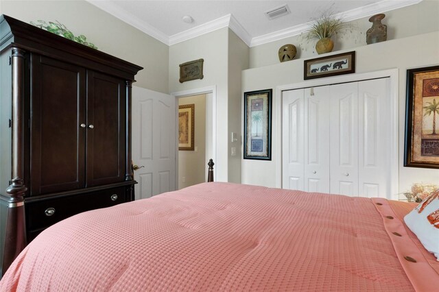 385 165th Ct NE, Bradenton, FL 34212 - bedroom featuring ornamental molding and a closet