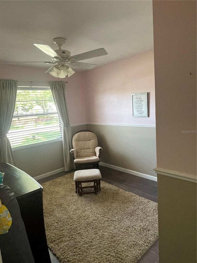 5094 Bunyan St, Sarasota, FL 34232 - sitting room featuring a ceiling fan and baseboards