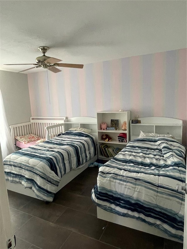 5094 Bunyan St, Sarasota, FL 34232 - bedroom with wallpapered walls and a ceiling fan