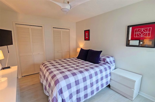1311 Siesta Bayside Dr Unit 1311-A, Sarasota, FL 34242 - bedroom with two closets and light wood-type flooring
