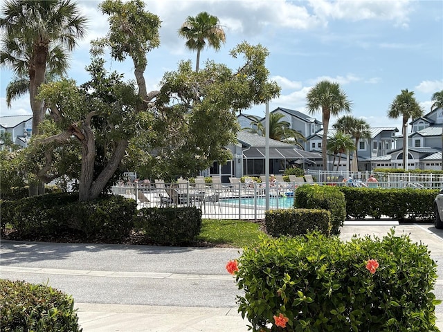 1311 Siesta Bayside Dr Unit 1311-A, Sarasota, FL 34242 - community pool with fence and a residential view