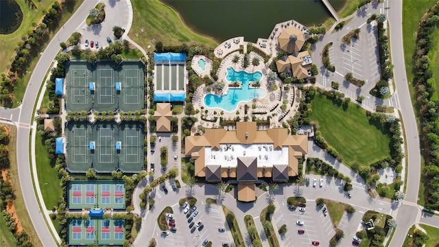 view of property location with a pool