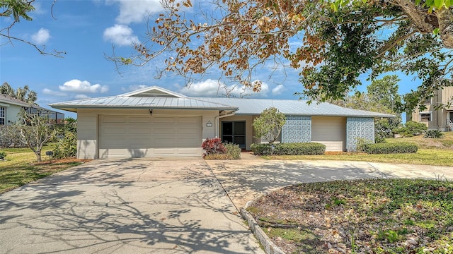 4361 Pompano Ln, Palmetto, FL 34221 - single story home featuring driveway, a garage, and metal roof
