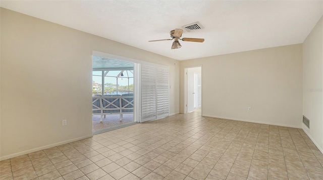 4361 Pompano Ln, Palmetto, FL 34221 - spare room with ceiling fan, baseboards, and a water view