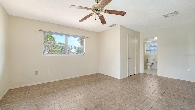 4361 Pompano Ln, Palmetto, FL 34221 - unfurnished room featuring healthy amount of natural light, ceiling fan, and baseboards