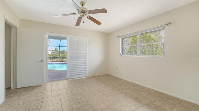 4361 Pompano Ln, Palmetto, FL 34221 - empty room with ceiling fan and baseboards
