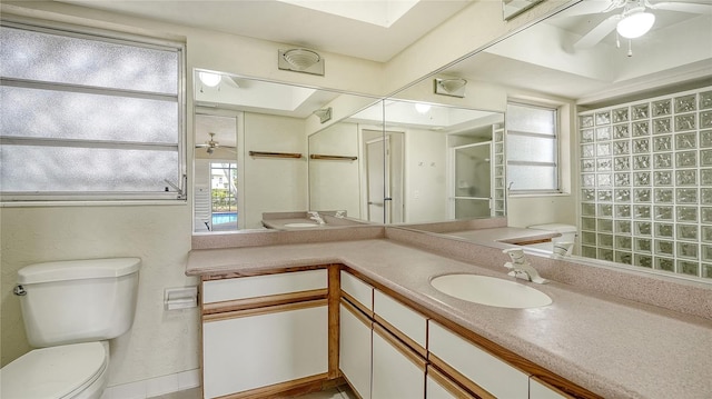 4361 Pompano Ln, Palmetto, FL 34221 - full bathroom with a ceiling fan, vanity, toilet, and walk in shower
