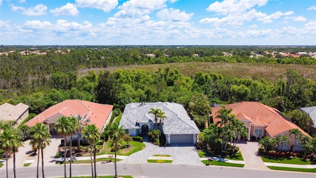 4239 Corso Venetia Blvd, Venice, FL 34293 - view from above of property with a heavily wooded area