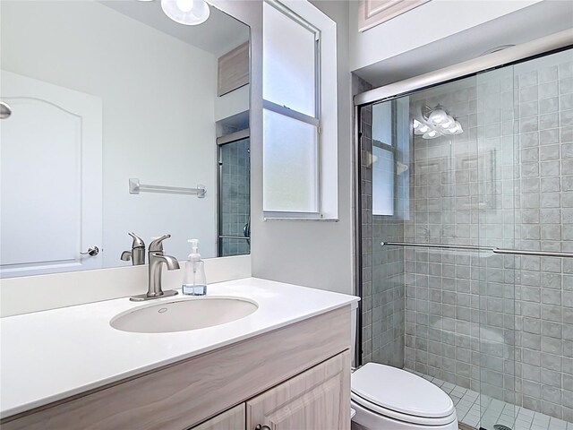 4239 Corso Venetia Blvd, Venice, FL 34293 - full bath featuring a stall shower, vanity, and toilet