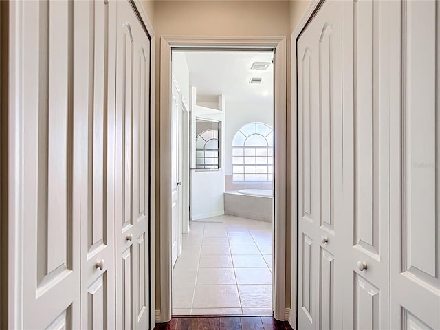 4239 Corso Venetia Blvd, Venice, FL 34293 - hall with dark tile patterned flooring