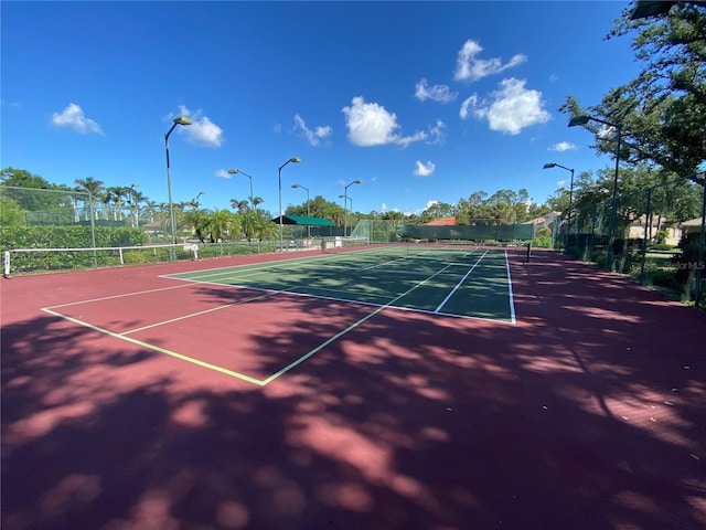 4239 Corso Venetia Blvd, Venice, FL 34293 - view of tennis court with community basketball court