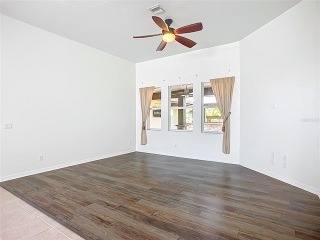 4239 Corso Venetia Blvd, Venice, FL 34293 - unfurnished room with ceiling fan, wood-type flooring, and baseboards