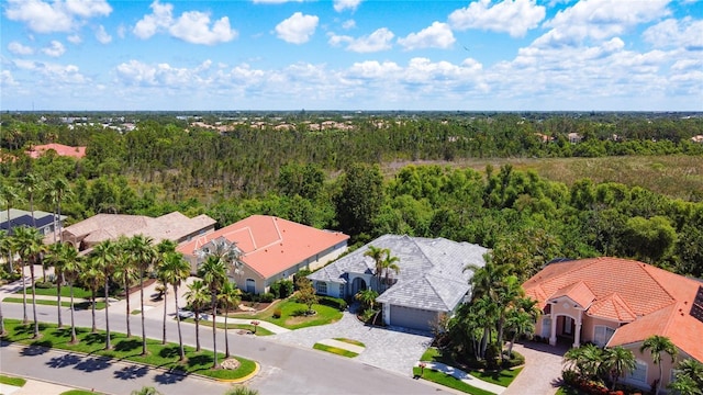 4239 Corso Venetia Blvd, Venice, FL 34293 - aerial perspective of suburban area with a forest
