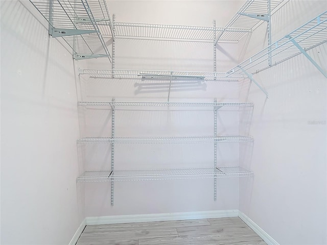 4239 Corso Venetia Blvd, Venice, FL 34293 - spacious closet with wood finished floors