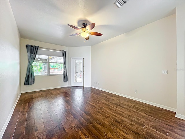 4239 Corso Venetia Blvd, Venice, FL 34293 - empty room with a ceiling fan, dark wood-style flooring, and baseboards