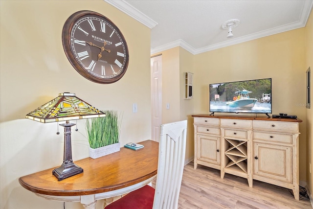 475 Benjamin Franklin Dr Unit 211, Sarasota, FL 34236 - dining area featuring crown molding and light wood-type flooring