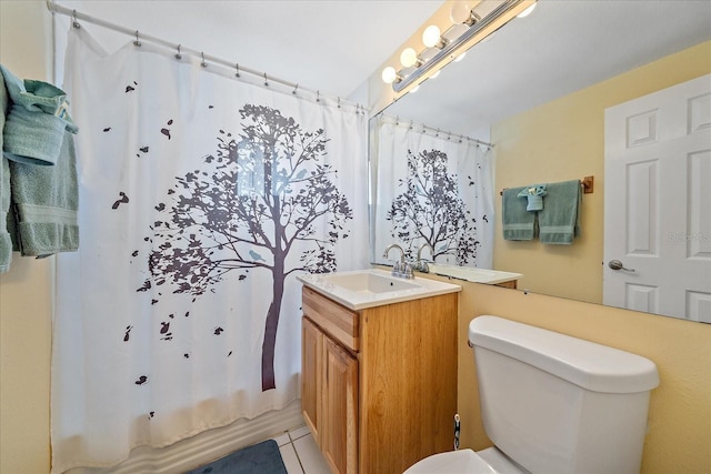 475 Benjamin Franklin Dr Unit 211, Sarasota, FL 34236 - full bathroom featuring toilet, tile patterned floors, vanity, and shower / bath combo with shower curtain