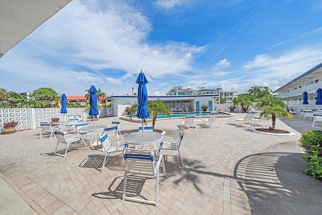 475 Benjamin Franklin Dr Unit 211, Sarasota, FL 34236 - community pool with fence and a patio