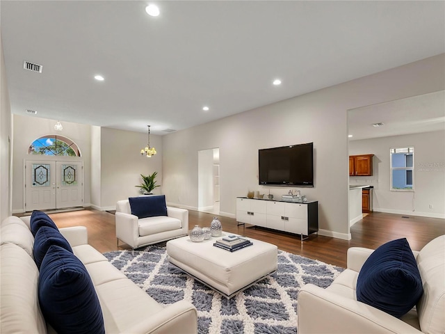 6248 Donnington Ct, Sarasota, FL 34238 - living room with a chandelier, dark wood finished floors, recessed lighting, and baseboards