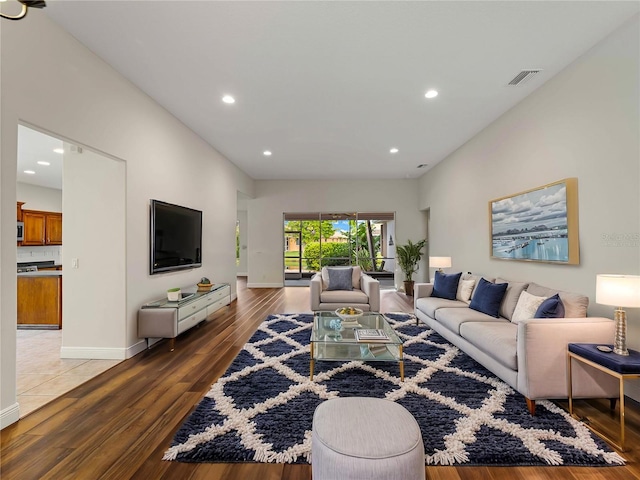 6248 Donnington Ct, Sarasota, FL 34238 - living area with wood finished floors, recessed lighting, and baseboards