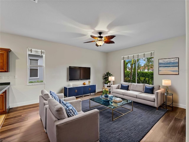 6248 Donnington Ct, Sarasota, FL 34238 - living area featuring baseboards, a ceiling fan, and wood finished floors