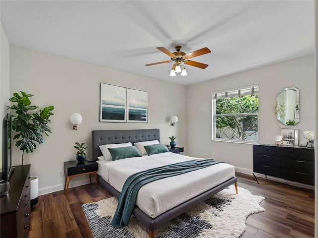 6248 Donnington Ct, Sarasota, FL 34238 - bedroom with baseboards, dark wood-style floors, and ceiling fan