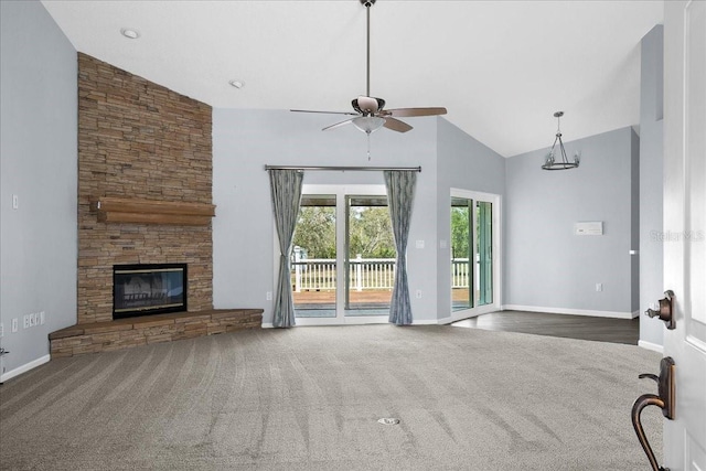 10001 289th St E, Myakka City, FL 34251 - unfurnished living room featuring a ceiling fan, high vaulted ceiling, carpet, and a fireplace