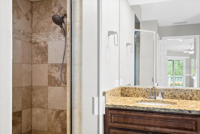 10001 289th St E, Myakka City, FL 34251 - bathroom featuring a shower stall, vanity, and ceiling fan