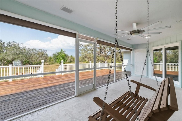 10001 289th St E, Myakka City, FL 34251 - sunroom featuring a ceiling fan