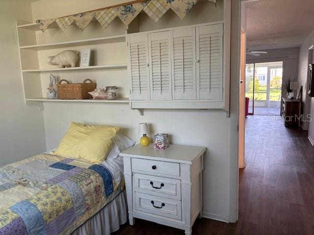 2218 Orange Blossom Ln Unit 0, Bradenton, FL 34207 - bedroom with dark wood-style floors