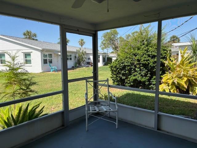 2218 Orange Blossom Ln Unit 0, Bradenton, FL 34207 - unfurnished sunroom with ceiling fan and healthy amount of natural light