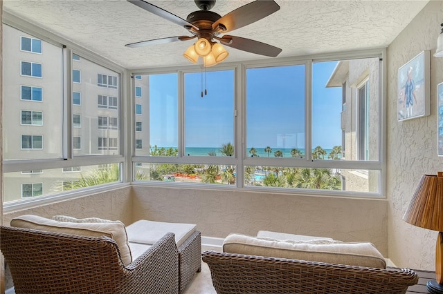 5916 Midnight Pass Rd Unit 404, Sarasota, FL 34242 - sunroom / solarium featuring a textured wall and a textured ceiling
