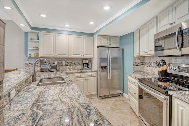 5916 Midnight Pass Rd Unit 404, Sarasota, FL 34242 - kitchen with appliances with stainless steel finishes, open shelves, a sink, light stone countertops, and backsplash