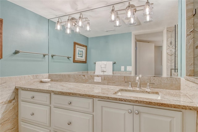5916 Midnight Pass Rd Unit 404, Sarasota, FL 34242 - bathroom featuring vanity and an enclosed shower