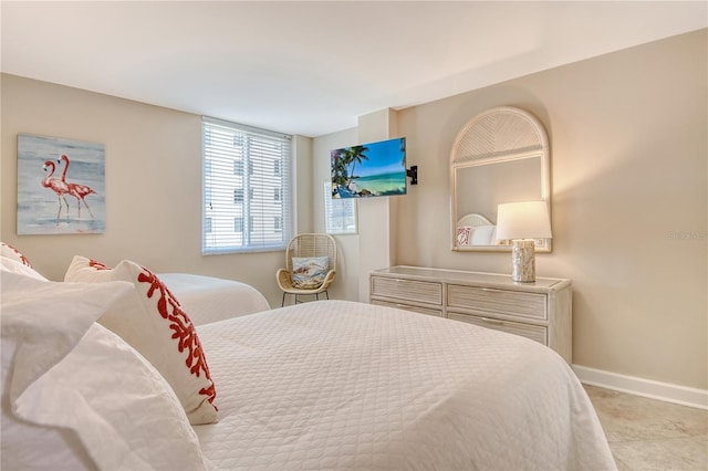 5916 Midnight Pass Rd Unit 404, Sarasota, FL 34242 - bedroom featuring baseboards